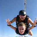 Camera flying with skydivers capturing footage