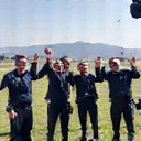 Skydivers celebrating after a successful jump